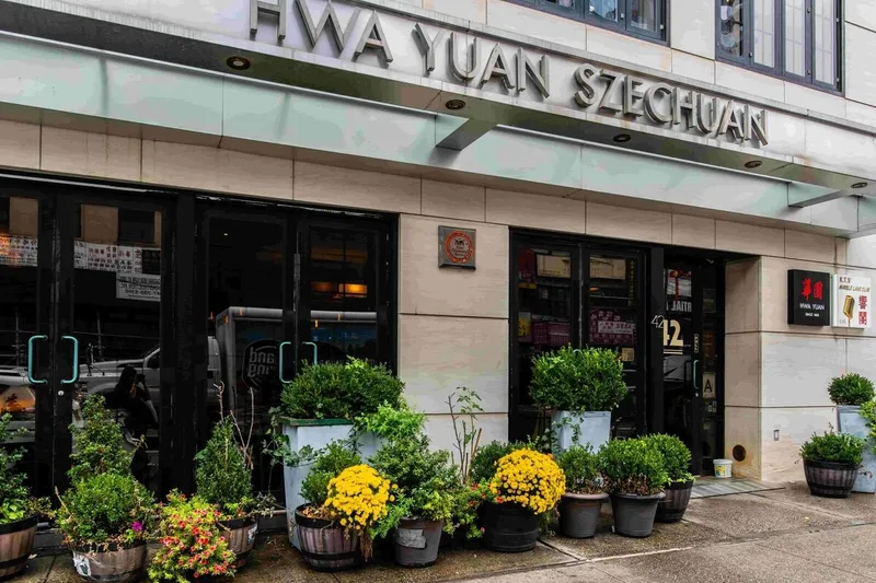 Flower-lined exterior entrance of Hwa Yuan Szechuan in New York