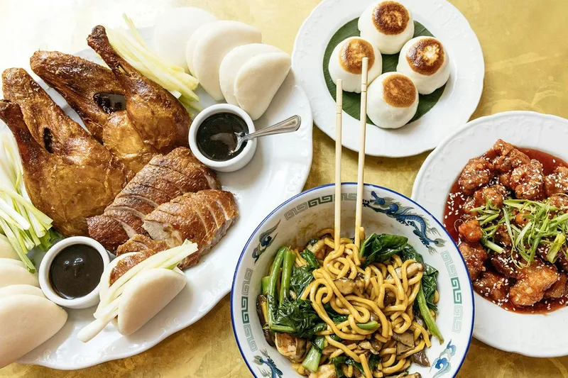 Asian food on a white plate from Brewery Bhavana