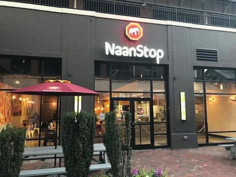 NaanStop Atlantic Station storefront with outdoor seating