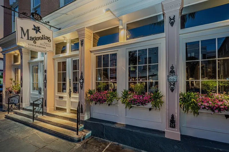 Magnolias restaurant's East Bay Street storefront at dusk