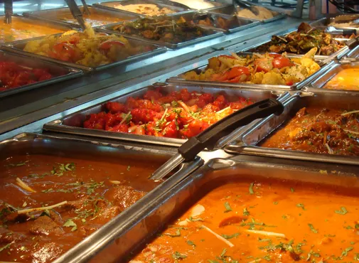 Buffet trays of curries and tandoori dishes on the hot line at Madhuban Indian Cuisine in Boise