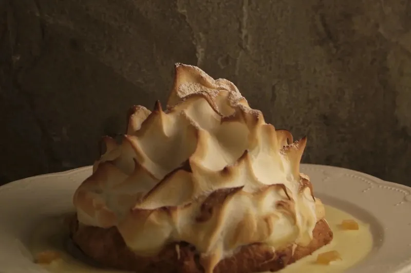 A torched meringue dessert with lemon custard at Al Forno