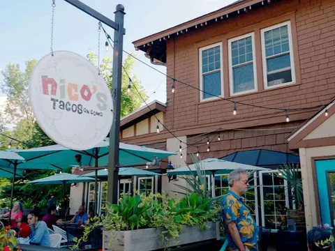 Patio umbrellas outside Nico's Taco Bar