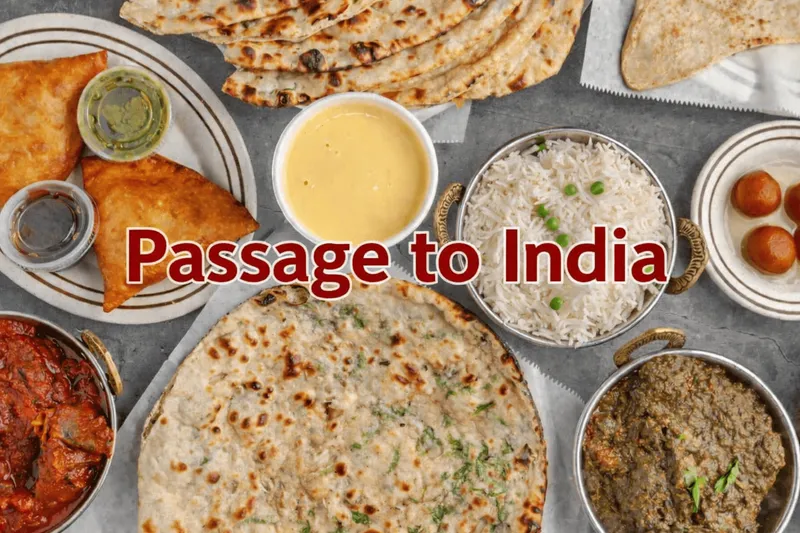 Overhead spread of Passage To India dishes — samosas, dal, basmati rice, paratha, curries and gulab jamun — with the restaurant's name overlaid