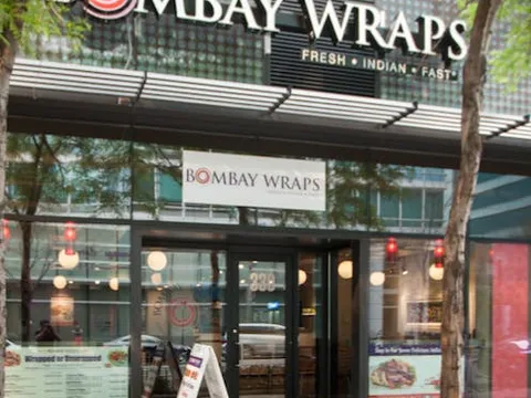 Bombay Wraps Streeterville storefront with the restaurant sign above its glass entrance