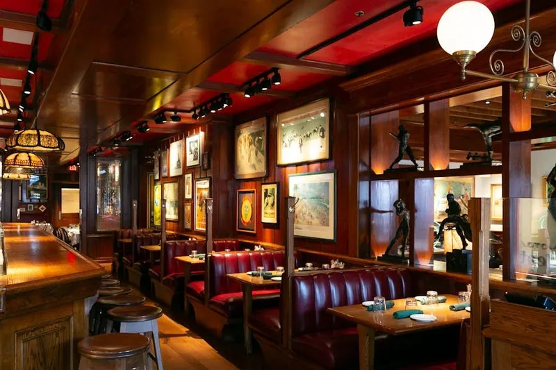 Bar and booth seating inside Clyde's of Georgetown