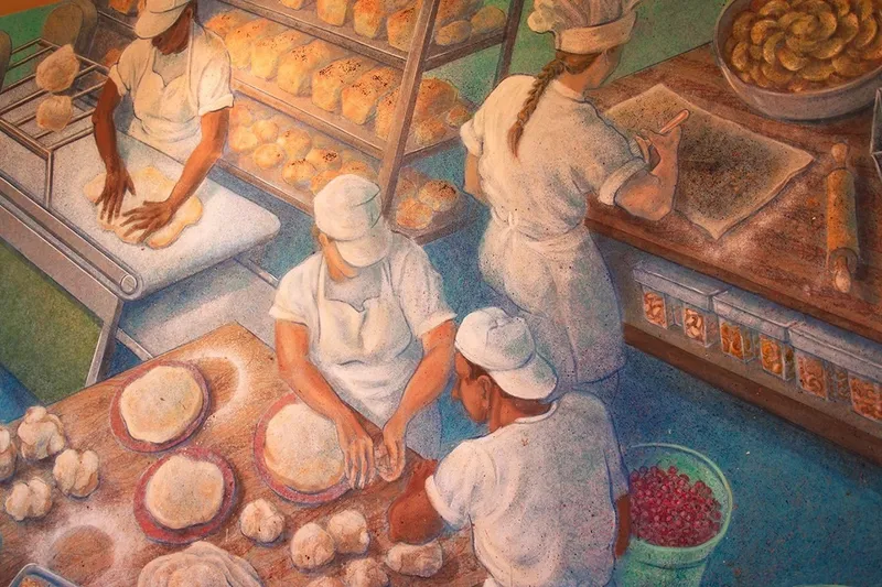 Baker kneading dough at Flying Star Cafe