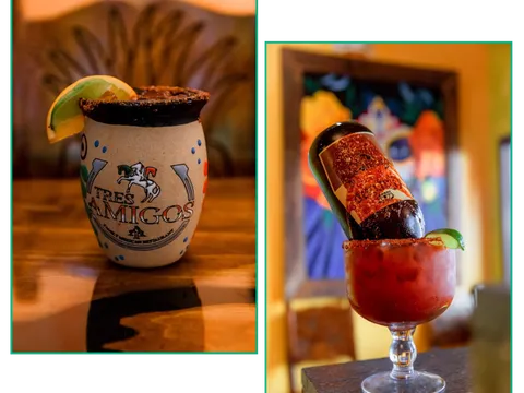 Tres Amigos-branded mug and a garnished michelada served at the bar