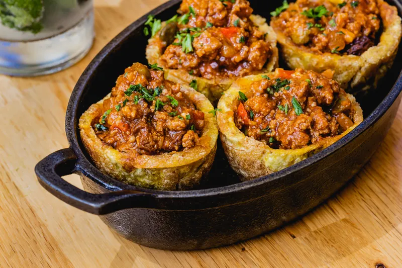Individual bread bowls of Cuban-style picadillo at Old's Havana Cuban Bar & Cocina