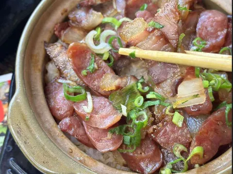 Clay pot rice topped with Chinese sausage, preserved meats and scallions at Clay Pot Cafe