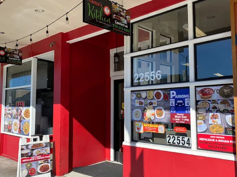 Storefront of Aama's Kitchen in Hayward, showing address 22556 Foothill Blvd