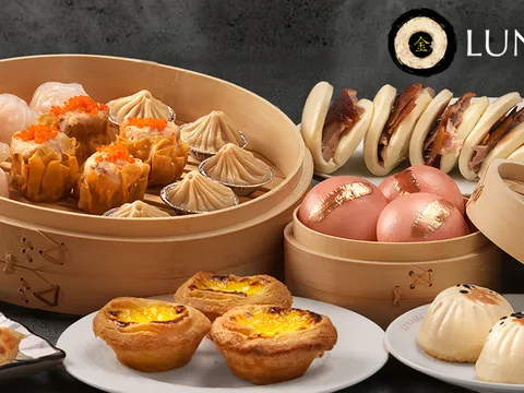 Bamboo steamers of dim sum and egg tarts at Lunasia