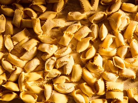 Close-up of freshly made semolina-dusted agnolotti pasta at Rolf and Daughters in Nashville