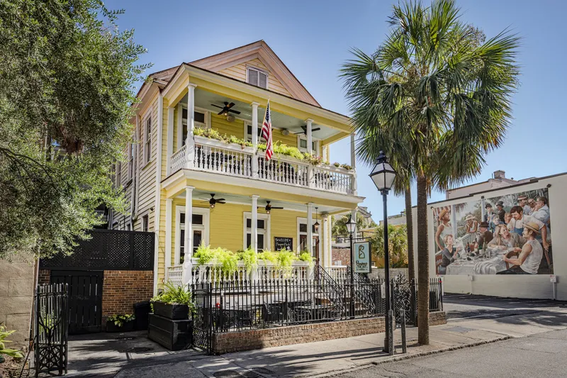 Poogan's Porch's yellow Victorian house on Queen Street
