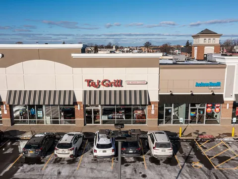 Taj Grill's storefront in a Delaware Avenue retail plaza in Buffalo