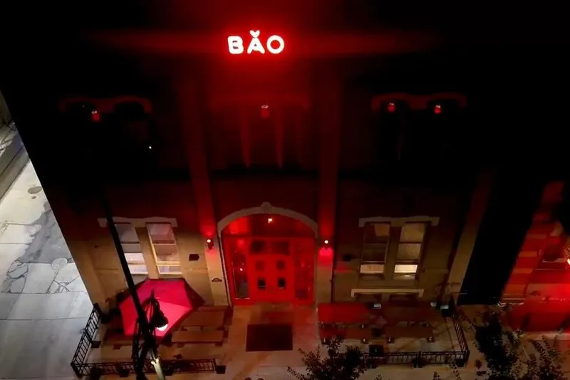 Bao Brewhouse entrance glowing red beneath its neon BAO sign