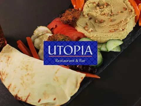 Mezze board with hummus, flatbread and crudites at Utopia Restaurant & Bar