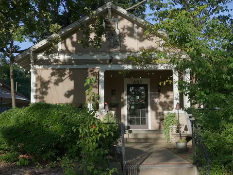 Tree-shaded exterior of Ciao Baci in the Hillcrest neighborhood of Little Rock