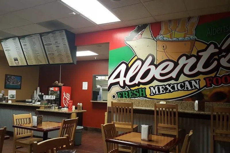 The dining room and wall sign at Albert's Fresh Mexican Food in San Diego.