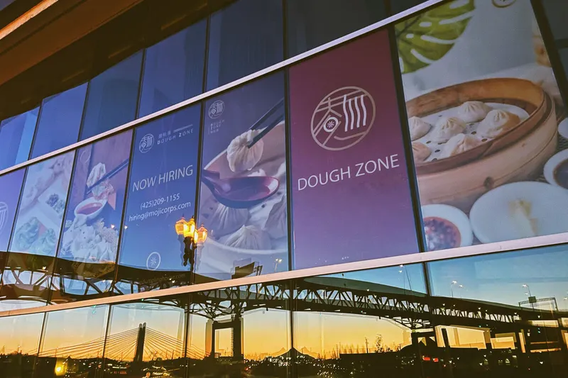 Dough Zone Pine Street storefront windows at sunset