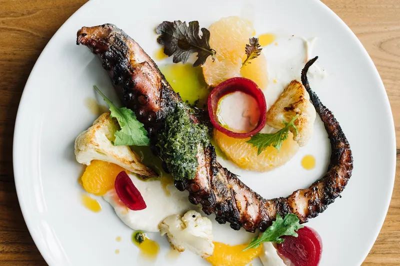Hearth-roasted octopus with cauliflower and citrus at St. Cecilia