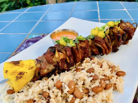 Grilled alambre de pastor skewer with rice and beans at La Fonda on Main