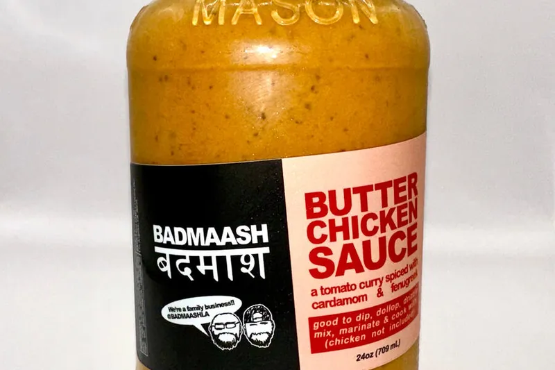 Jar of Badmaash butter chicken sauce on a white background