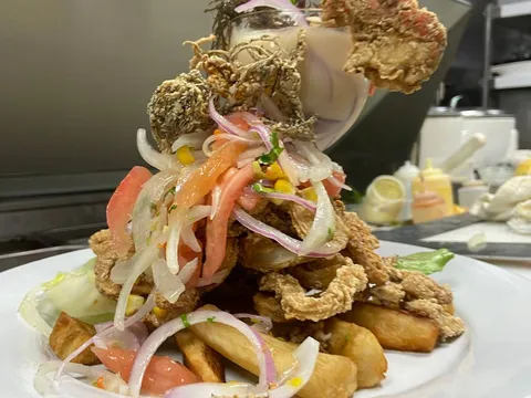 Jalea Tullpa seafood platter with fried plantains at Tullpa Peruvian Restaurant