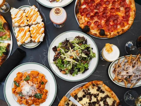 Pizza, pasta, salad, and cocktails from Reilly Craft Pizza & Drink