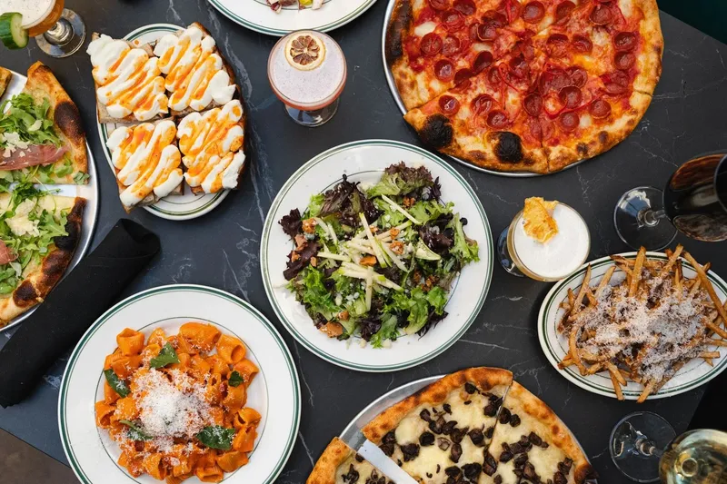 Pizza, pasta, salad, and cocktails from Reilly Craft Pizza & Drink