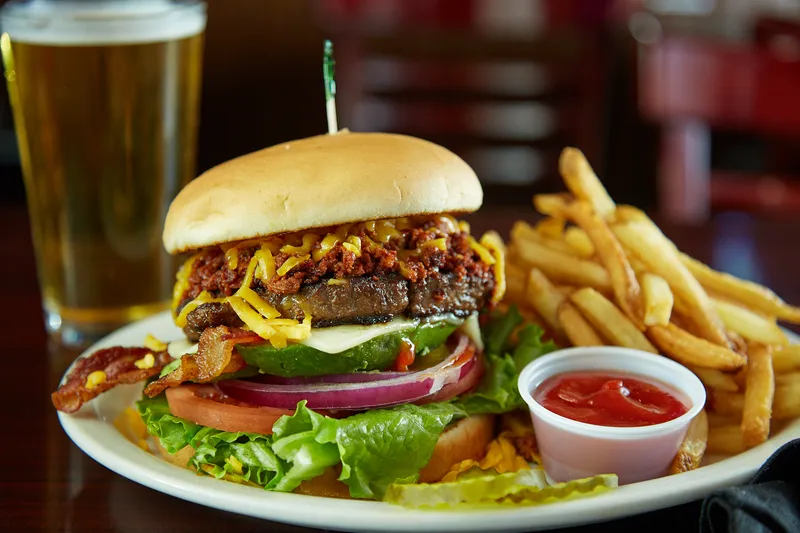 Angry Dog burger with fries and a beer