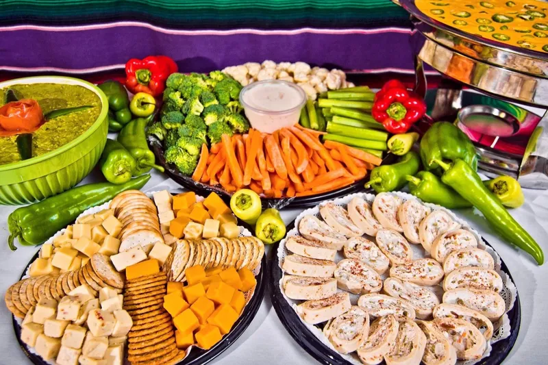 Catering platters of crudites, dips and pinwheel wraps at Garcia's Kitchen