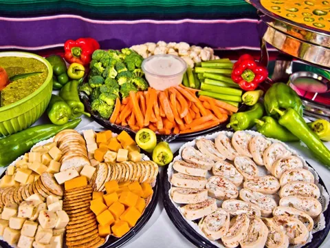 Catering platters of crudites, dips and pinwheel wraps at Garcia's Kitchen