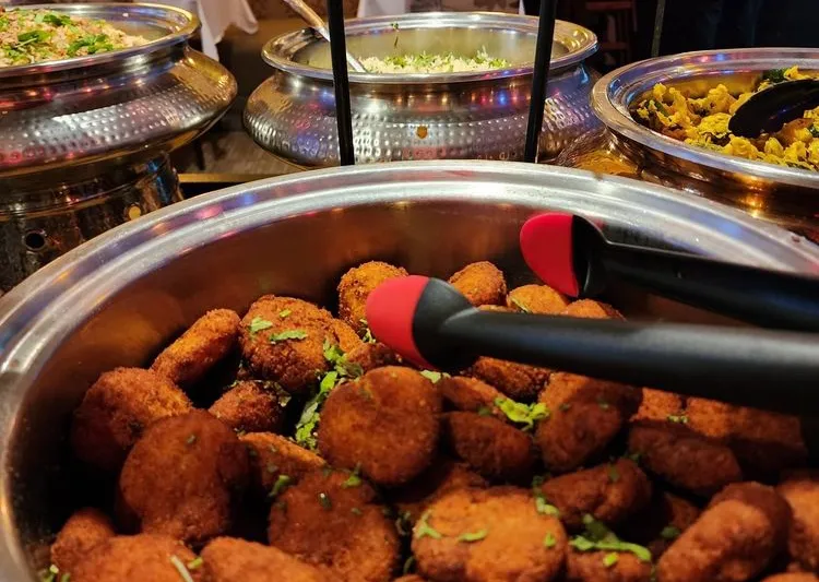 Buffet handi of Dahi Ke Kabab and other dishes at Sakoon in Fremont