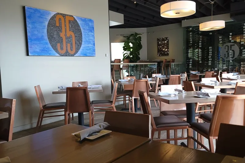 Dining room at Bin 35 Bistro with a wine display