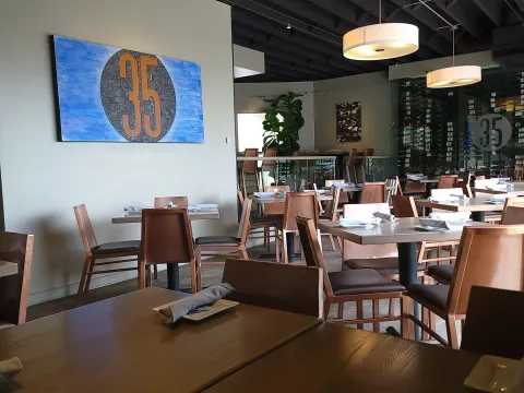 Dining room at Bin 35 Bistro with a wine display