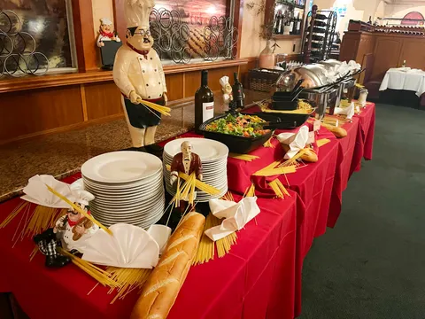 Interior of Marcello's Italian Restaurant, dining room and buffet spread