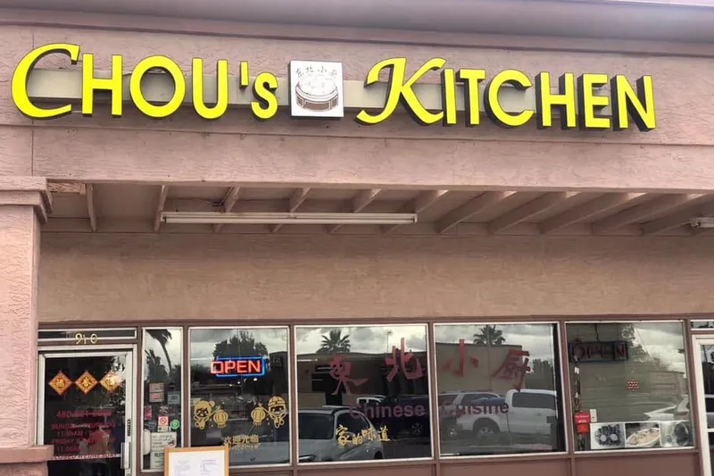 Chou's Kitchen storefront with yellow lettering above the entrance
