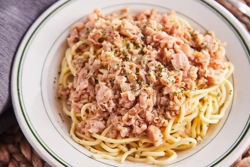 Bowl of spaghetti in a chunky tomato and pancetta sauce at Ristorante Attilio