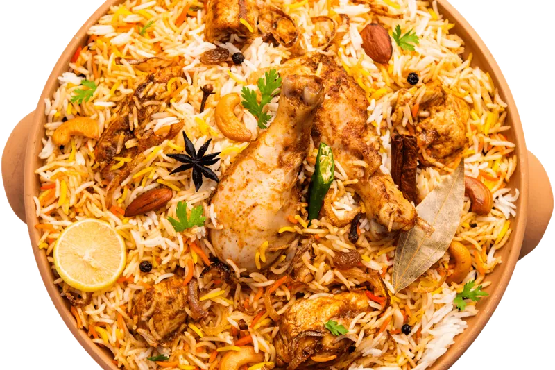 Chicken biryani served in a clay pot at Vayal's Indian Kitchen