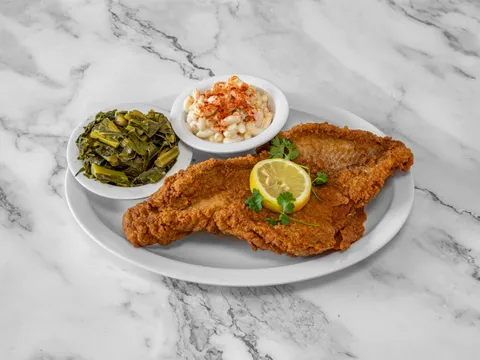 Fried catfish plate with collard greens and macaroni salad at Mrs. White's Golden Rule Cafe in Phoenix