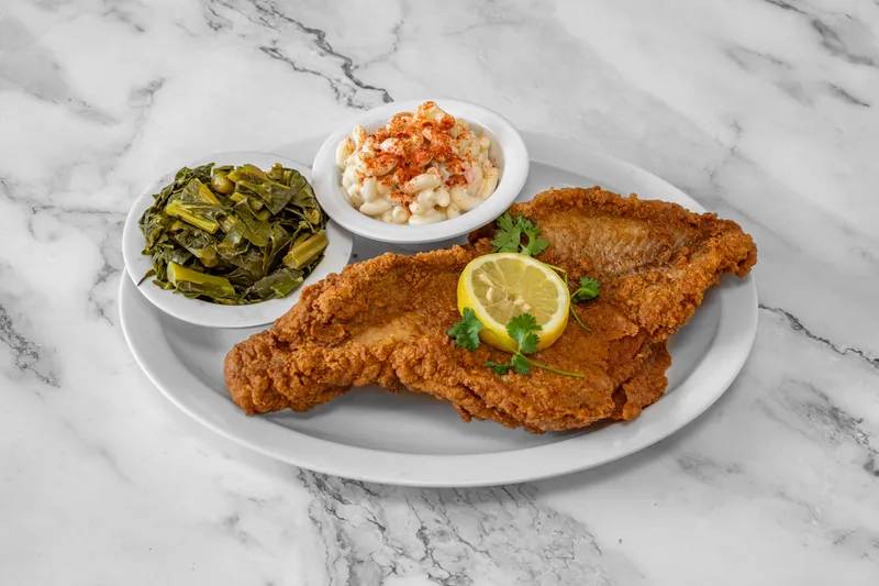 Fried catfish plate with collard greens and macaroni salad at Mrs. White's Golden Rule Cafe in Phoenix