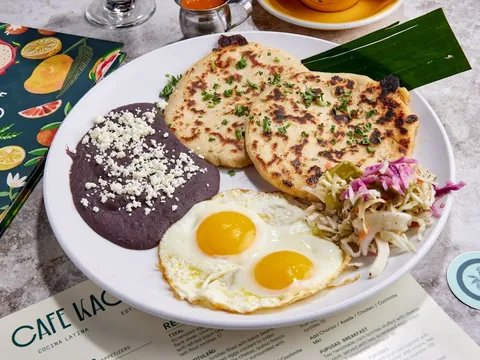 Cafe Kacao breakfast plate with eggs, black beans, plantains and tortillas