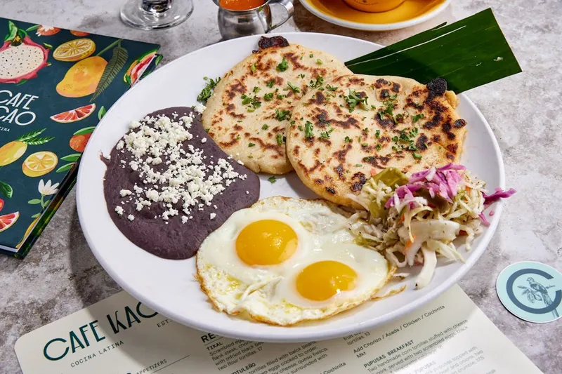 Cafe Kacao breakfast plate with eggs, black beans, plantains and tortillas