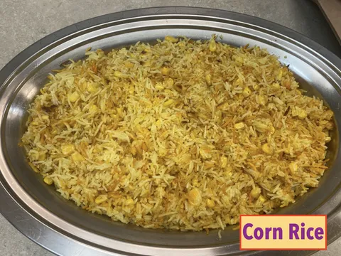 Tray of golden corn rice prepared by Kumari Restaurant in Baltimore
