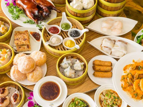 Overhead spread of dim sum in bamboo steamers at Koi Palace
