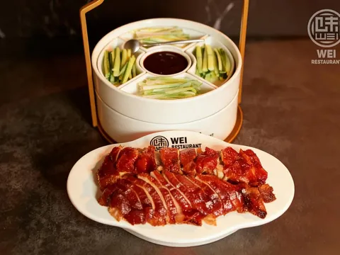 Wei Restaurant roast duck served with steamed pancakes and accompaniments