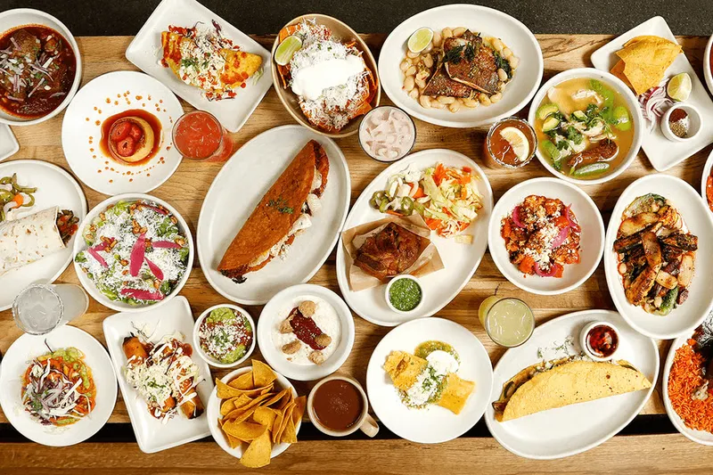 Large overhead spread of Mexican dishes at Nopalito