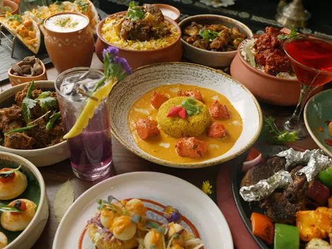 Spread of Indian small plates, curries and cocktails at Sankranti
