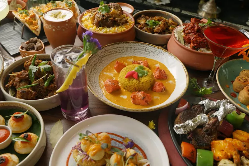 Spread of Indian small plates, curries and cocktails at Sankranti